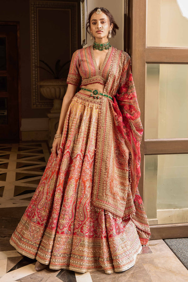 Embroidered lehenga, blouse, and dupatta