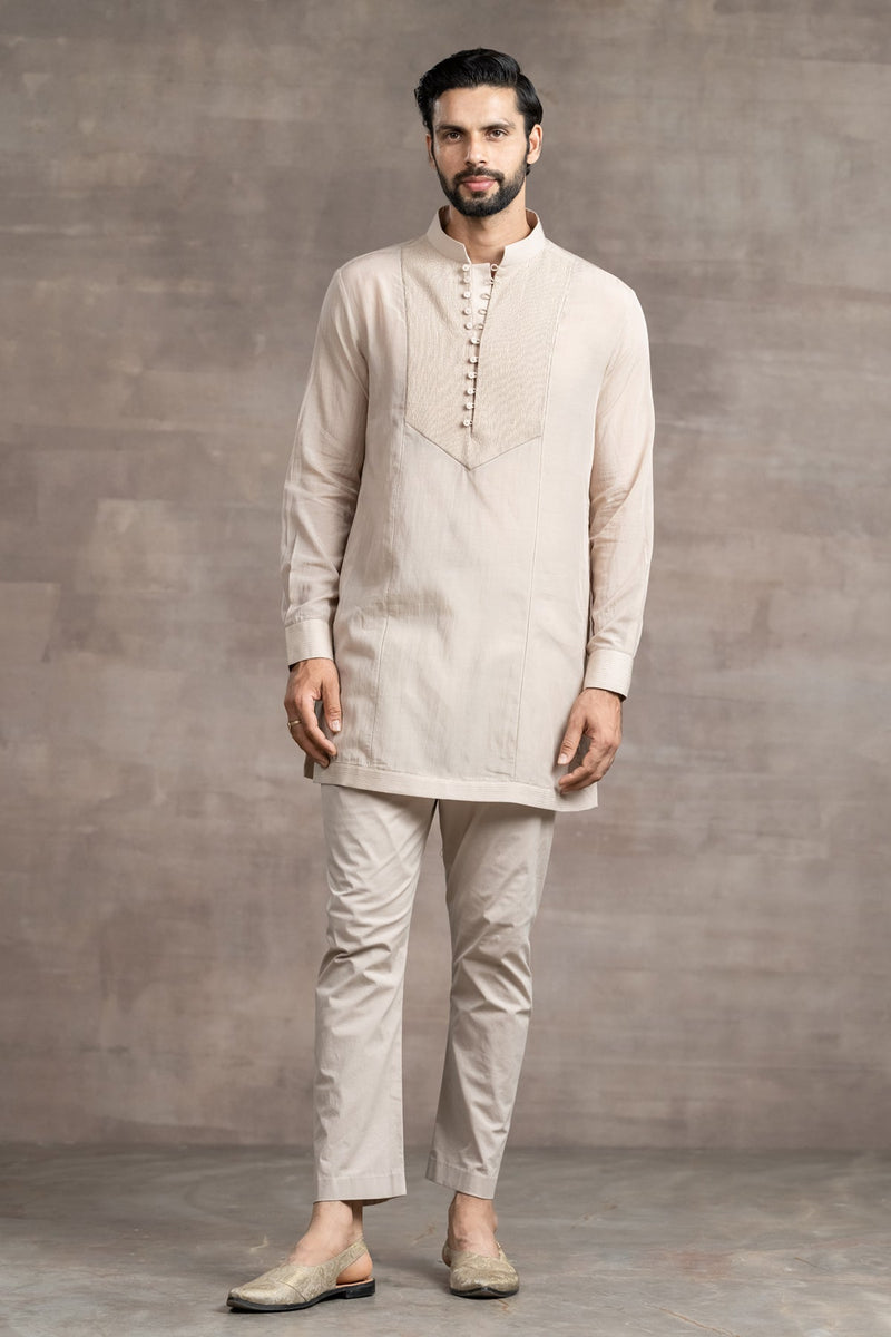 short kurta paired with matching Aligarhi pants