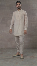 short kurta paired with matching Aligarhi pants