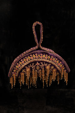 A hand embroidered soft body polti bag