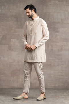 short kurta paired with matching Aligarhi pants