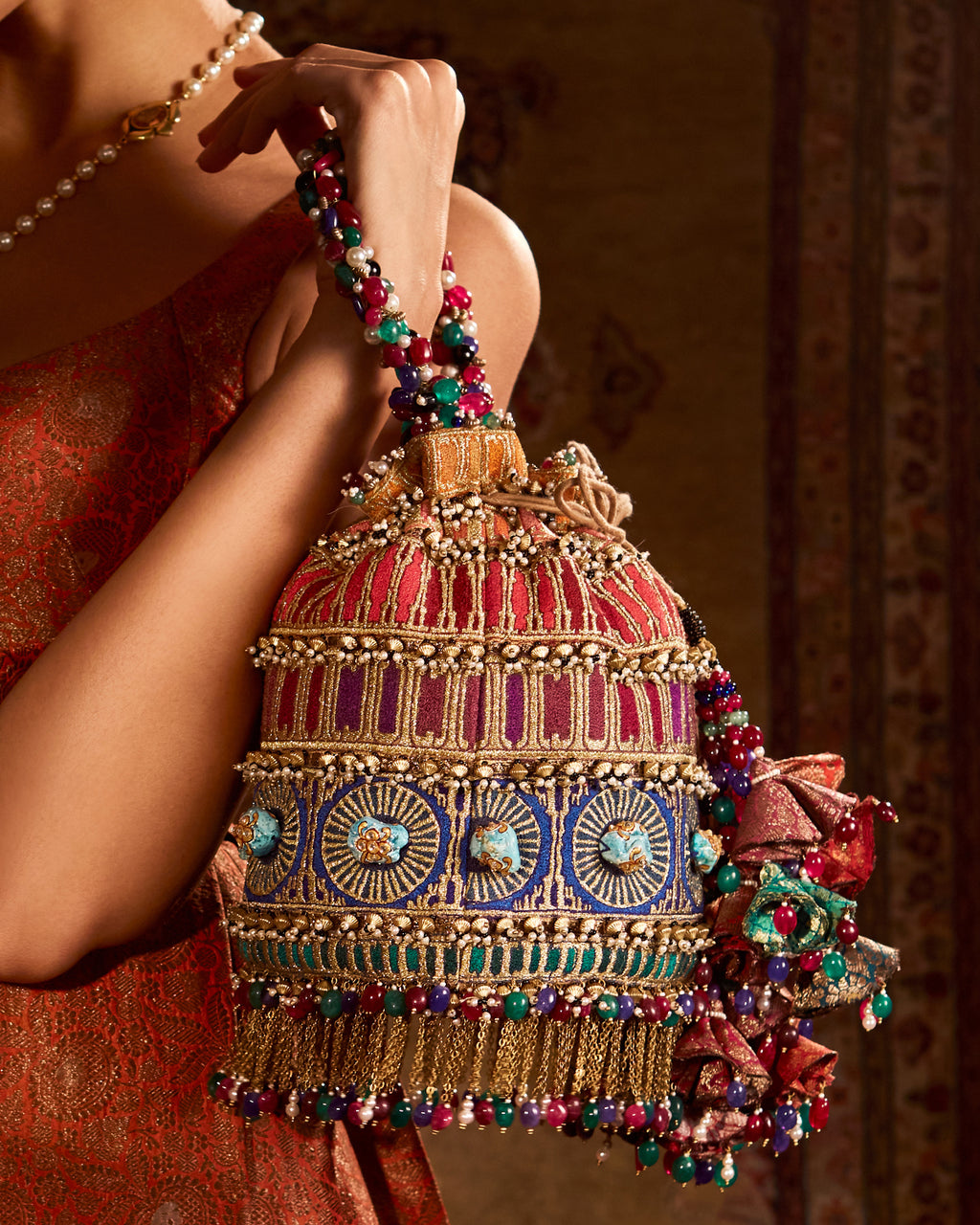 Rajasthani Designer Potli Golden Embroidery Bag Pearl Handle And Tassel  Ethnic Purse Women's Handbag (Red Maroon): Handbags: Amazon.com