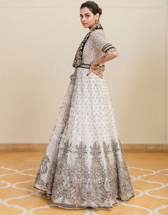 Anarkali In Tulle Featuring Resham And Badla Embroidery, Paired With An Embroidered Dupatta And Churidar.