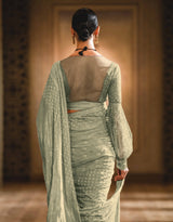 Mukaish and chikankari two piece saree paired with a blouse and a peticoat